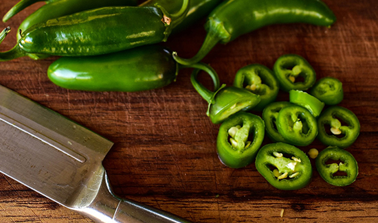 Taco tuesdays include using diced jalapenos and peppers for flavor