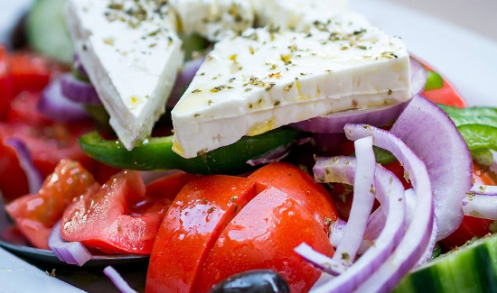 Better your health and keep yourself at a stable weight by incorporating more salads like tomato and feta